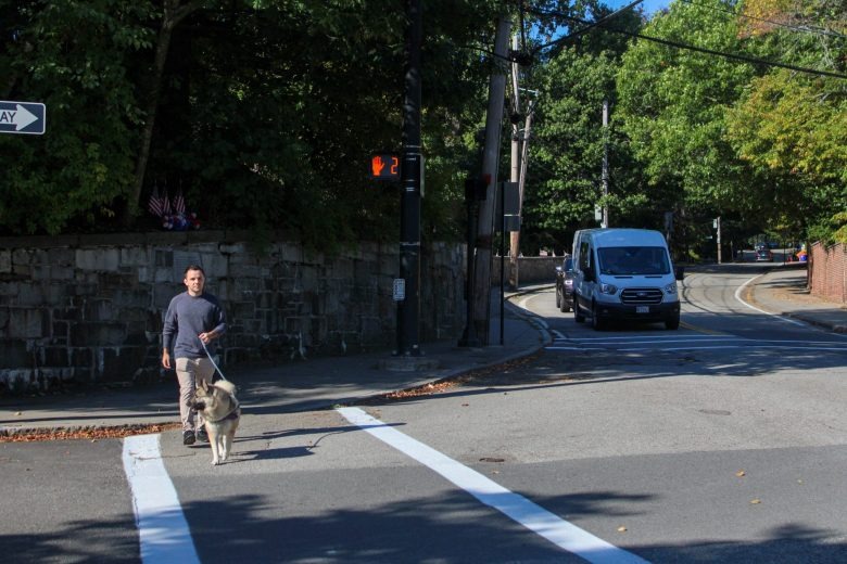 The town changed how crosswalk signals work because of the pandemic. Here’s why some of them haven’t changed back.