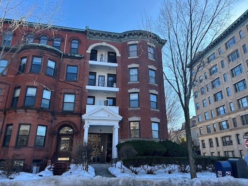 A plan for 18 small apartments in a vacant office building turned into four big luxury condos. Housing advocates aren’t happy.